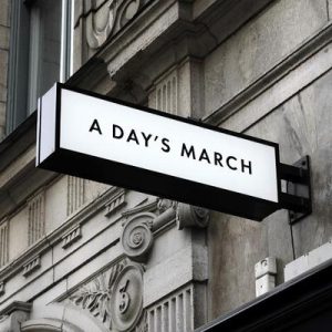 a day's march store sign